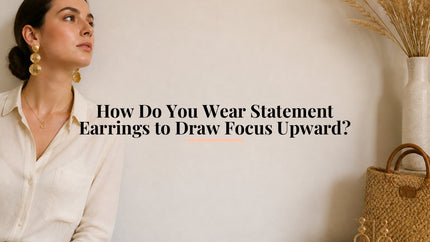 How Do You Wear Statement Earrings to Draw Focus Upward?