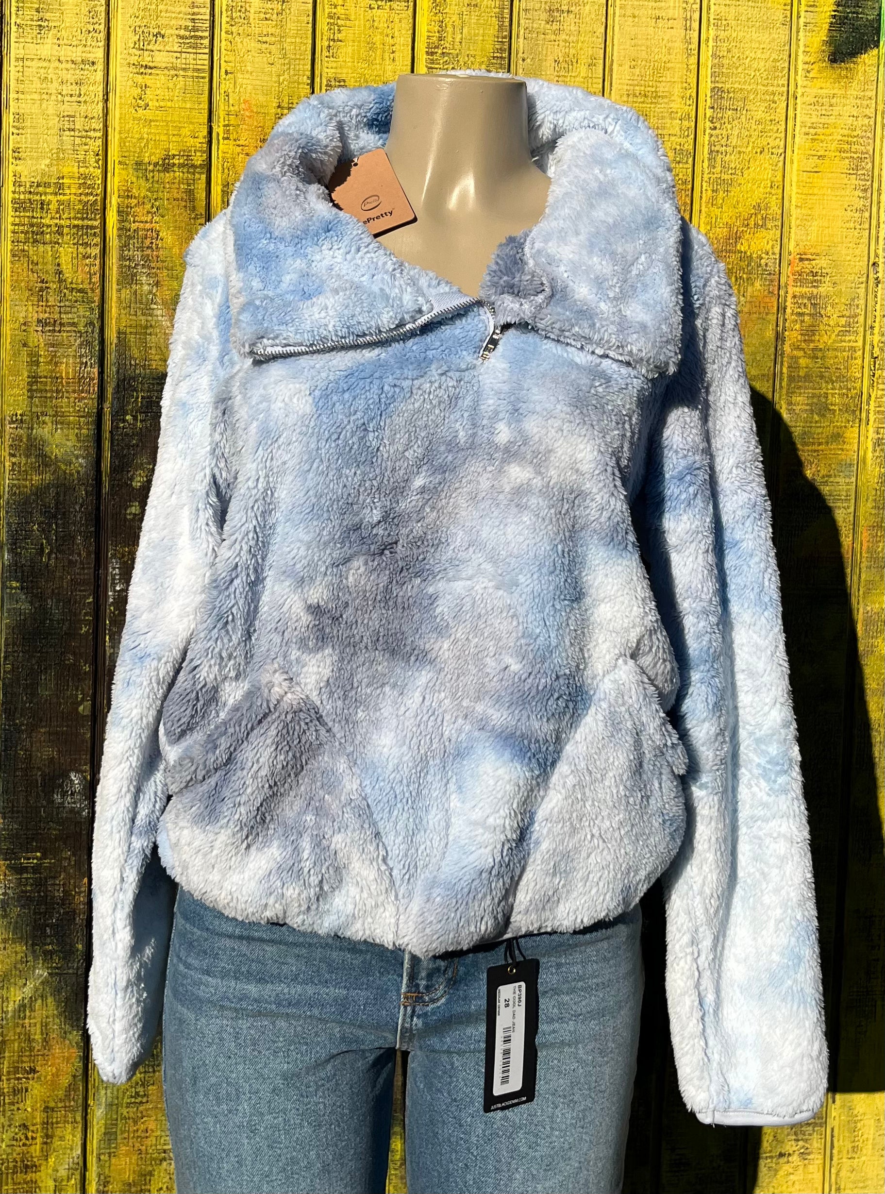 ePretty tie-dye sherpa jacket with colorful, cozy fleece exterior and plush lining, perfect for casual wear and chilly days.