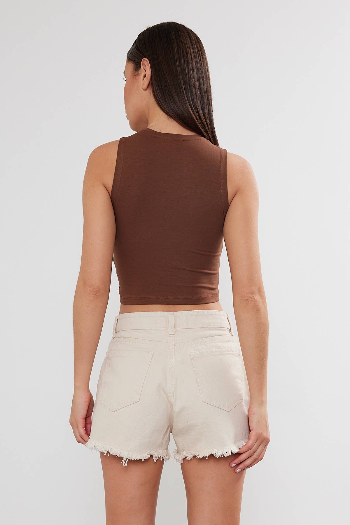 VAV NEW YORK women's cropped cotton crew neck tank top, basic sleeveless top for casual wear, shown in white.