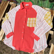 Color block blouse w/ solid, stripes, & plaid multicolored prints in deep coral, mustard & white textured design.