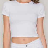 Popular 21 crew neck short sleeve cotton crop top shown on a model, featuring a classic fit and soft fabric for casual wear.