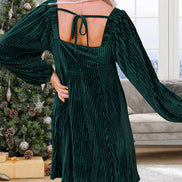 Black velvet babydoll dress with square neckline and tie-back detail, designed by 1 the Woman.