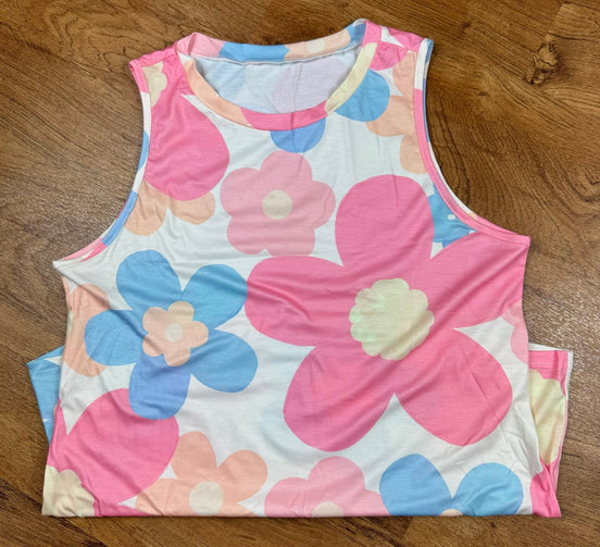 Aapparella big pink floral print tank top featuring vibrant flower patterns and a relaxed fit, perfect for casual summer wear.
