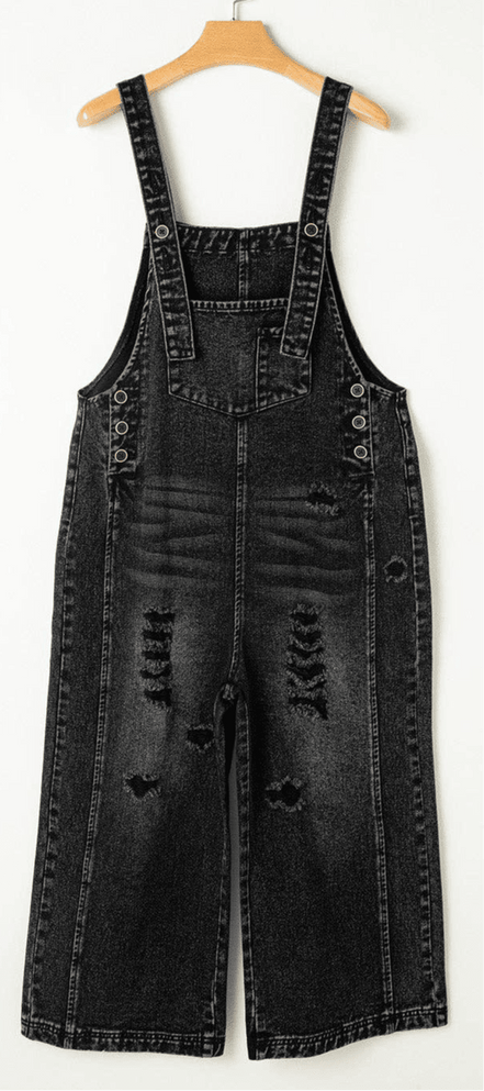 Light blue denim distressed bib pocket overalls by PRETTY BASH, featuring adjustable straps and front chest pockets.