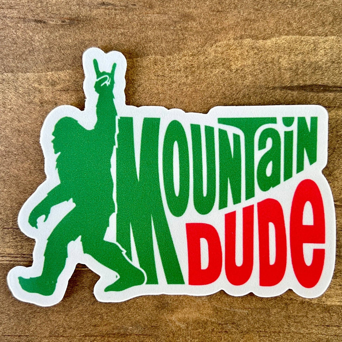 Colorful Mountain Dude Bigfoot sticker by 208 Tees featuring a cartoon Bigfoot.