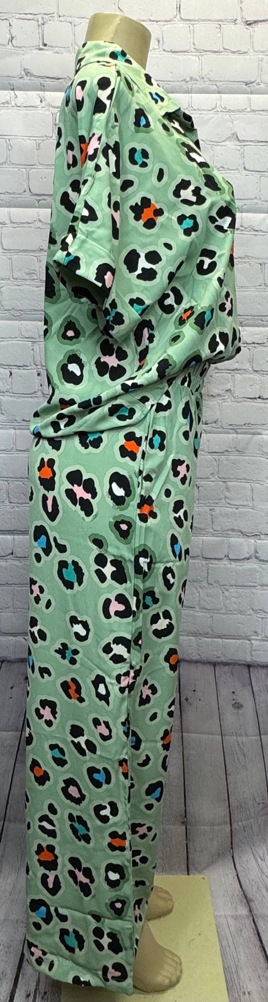Aapparella leopard print shirt and wide-leg pants showcasing trendy animal print fashion ensemble.
