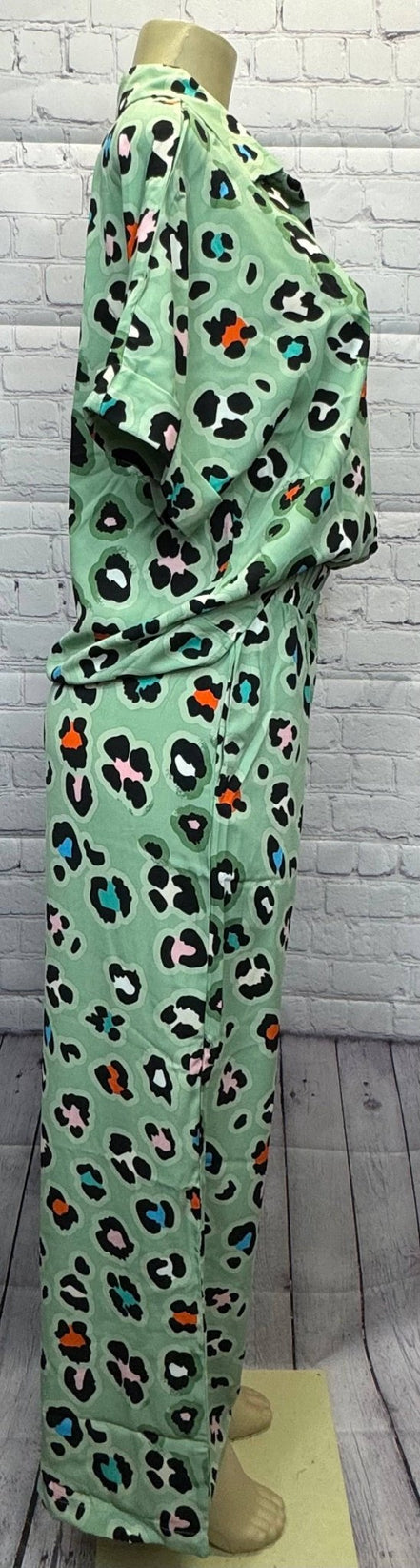 Aapparella leopard print shirt and wide-leg pants showcasing trendy animal print fashion ensemble.