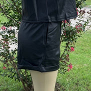 42POPS brand. Vegan leather short set. Rounded neck top w/ short sleeves and drawstring, elastic waist, cuffed bottom shorts.