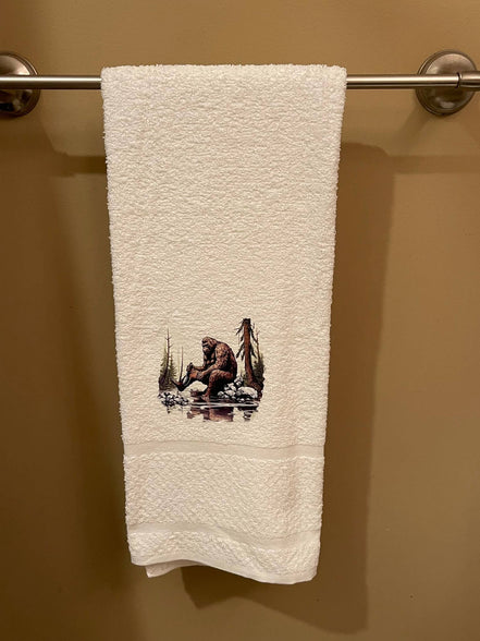 Squatchin’ Country Bathing Bigfoot 3-piece towel set with nature-inspired designs, including bath towels and hand towels.