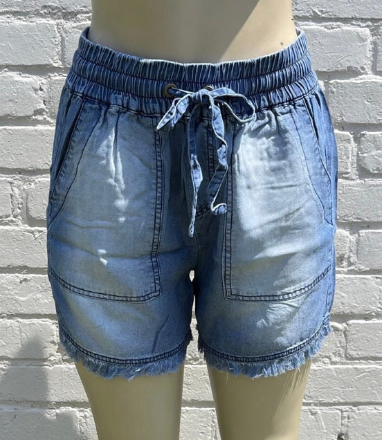 Blue chambray shorts by 42POPS, featuring a casual fit with frayed hems and pockets for a relaxed summer look.