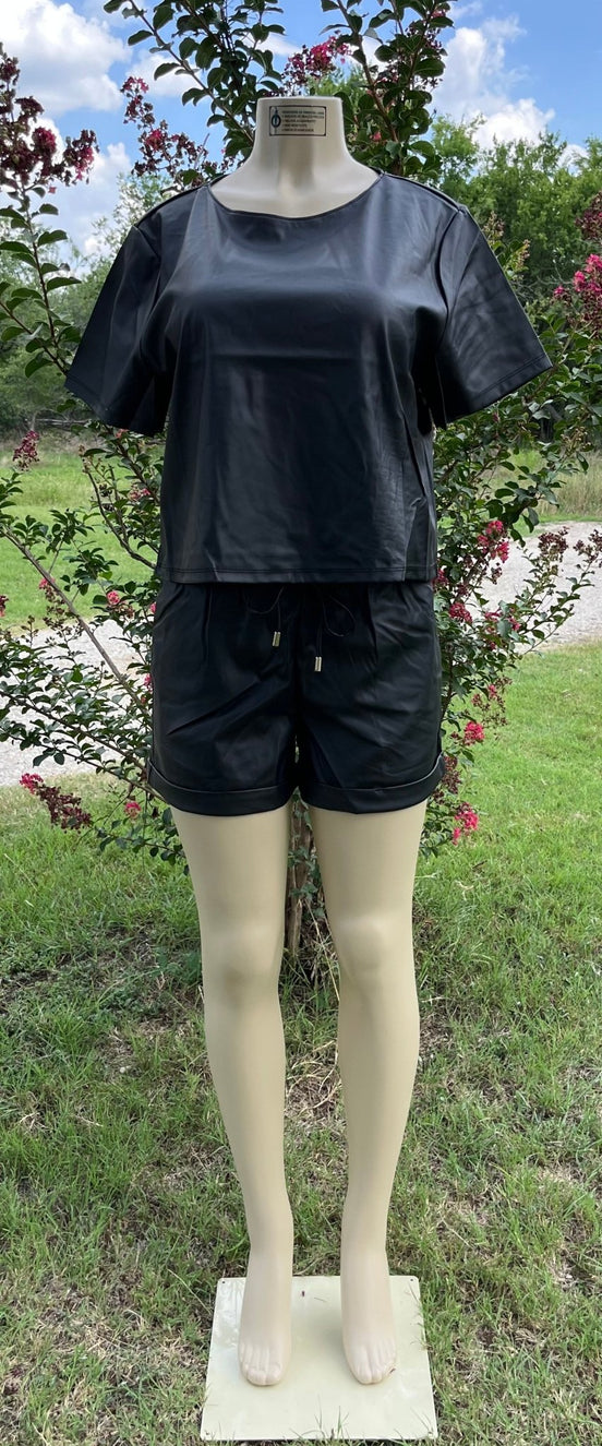 Vegan leather short set by 42POPS featuring a fitted top and matching high-waisted shorts for a stylish casual look.
