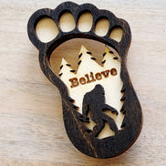 Big Foot magnet featuring a detailed, humorous Big Foot design, perfect for displaying on refrigerators or metal surfaces.