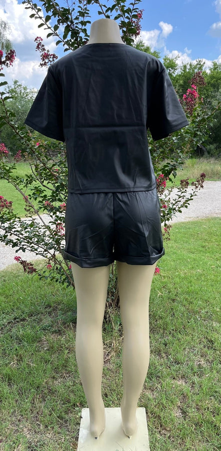42POPS brand. Vegan leather short set. Rounded neck top w/ short sleeves and drawstring, elastic waist, cuffed bottom shorts.