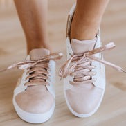 Colorful patchwork sneakers by Liam & Company featuring mixed fabric panels and casual lace-up design.