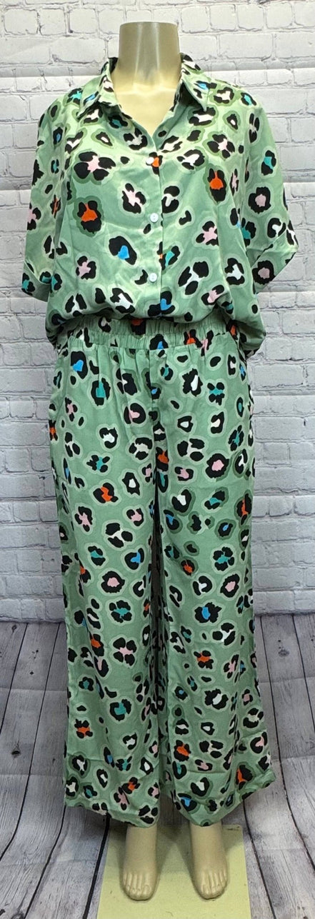 Leopard print shirt and wide-leg pants set by Aapparella, featuring stylish animal print fabric and relaxed fit.