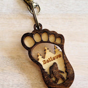 Big Foot keychain with detailed Sasquatch figure, attached to a metal keyring, from The Country Roost.