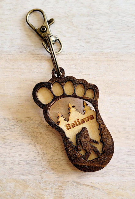 Big Foot keychain with detailed Sasquatch figure, attached to a metal keyring, from The Country Roost.