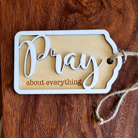 Wooden "Pray About Everything" sign by The Country Roost featuring a rustic design and inspirational message for home decor.