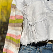 Bellissima Fashion denim patchwork jacket with mixed denim panels and stylish stitching, displayed on a hanger.