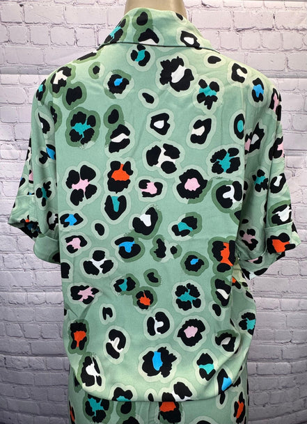Aapparella leopard print shirt and wide-leg pants set, featuring a stylish matching top and flowy trousers for a trendy look.