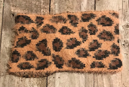 Pretty Simple leopard twist headband with black and tan leopard print, stylish accessory for hair and fashion.