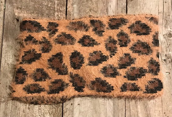 Pretty Simple leopard twist headband with black and tan leopard print, stylish accessory for hair and fashion.