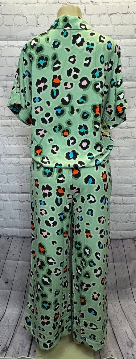 Aapparella leopard print shirt and wide-leg pants set showcasing stylish animal print fashion ensemble.