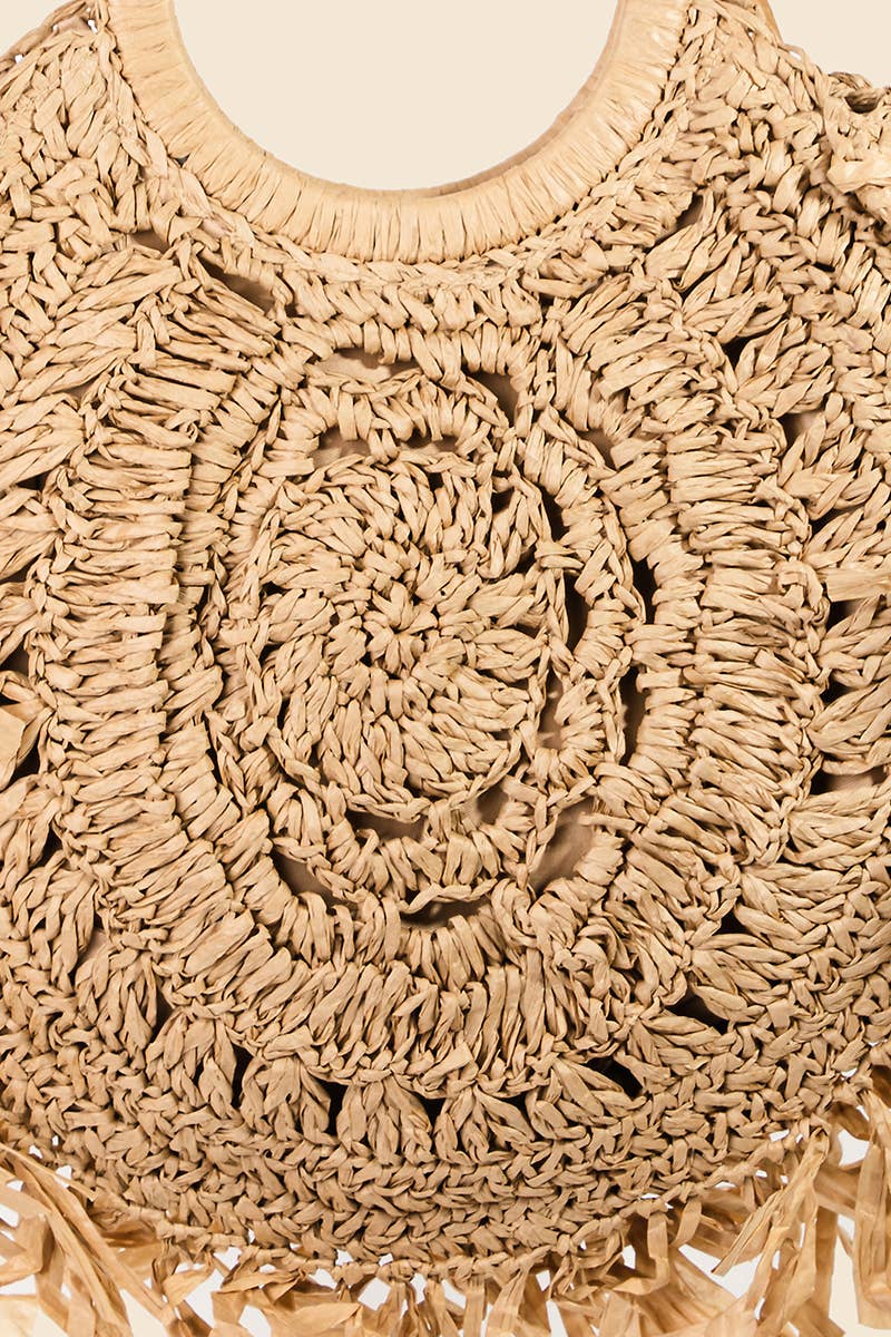 Straw braided fringe bag by Anarchy Street featuring woven straw material and decorative fringe detailing.