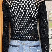 ADORA LA brand. This front tie crocheted cardigan is available in black or cream. Randomly sewn multicolored granny squares.