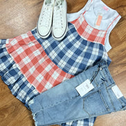 This red & blue denim checkered plaid baby doll top is tiered with a ruffled hem. Actual color may vary from images shown.