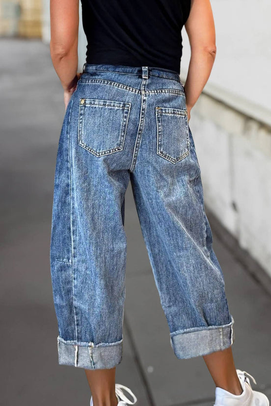 A pair of stitched raw hem wide-leg loose jeans from Aapparella featuring a relaxed fit and casual style.