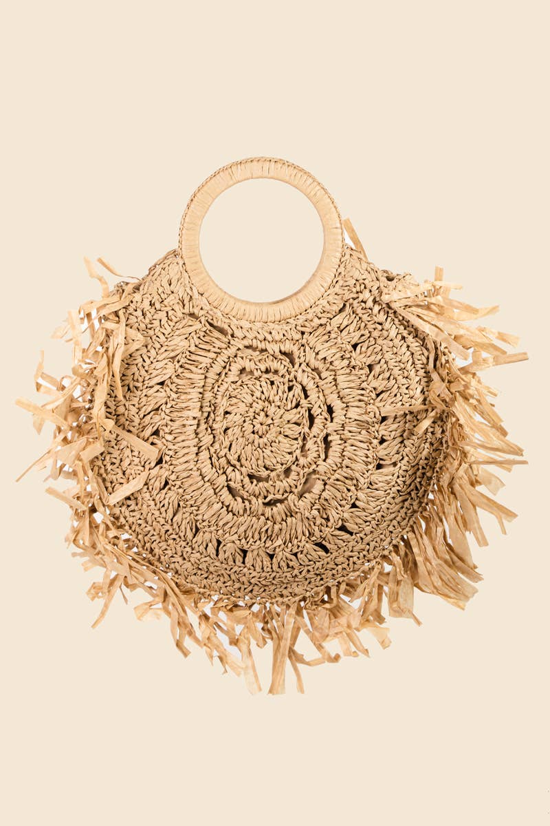 Straw braided fringe bag by Anarchy Street featuring woven design and fringed accents for a boho-chic look.