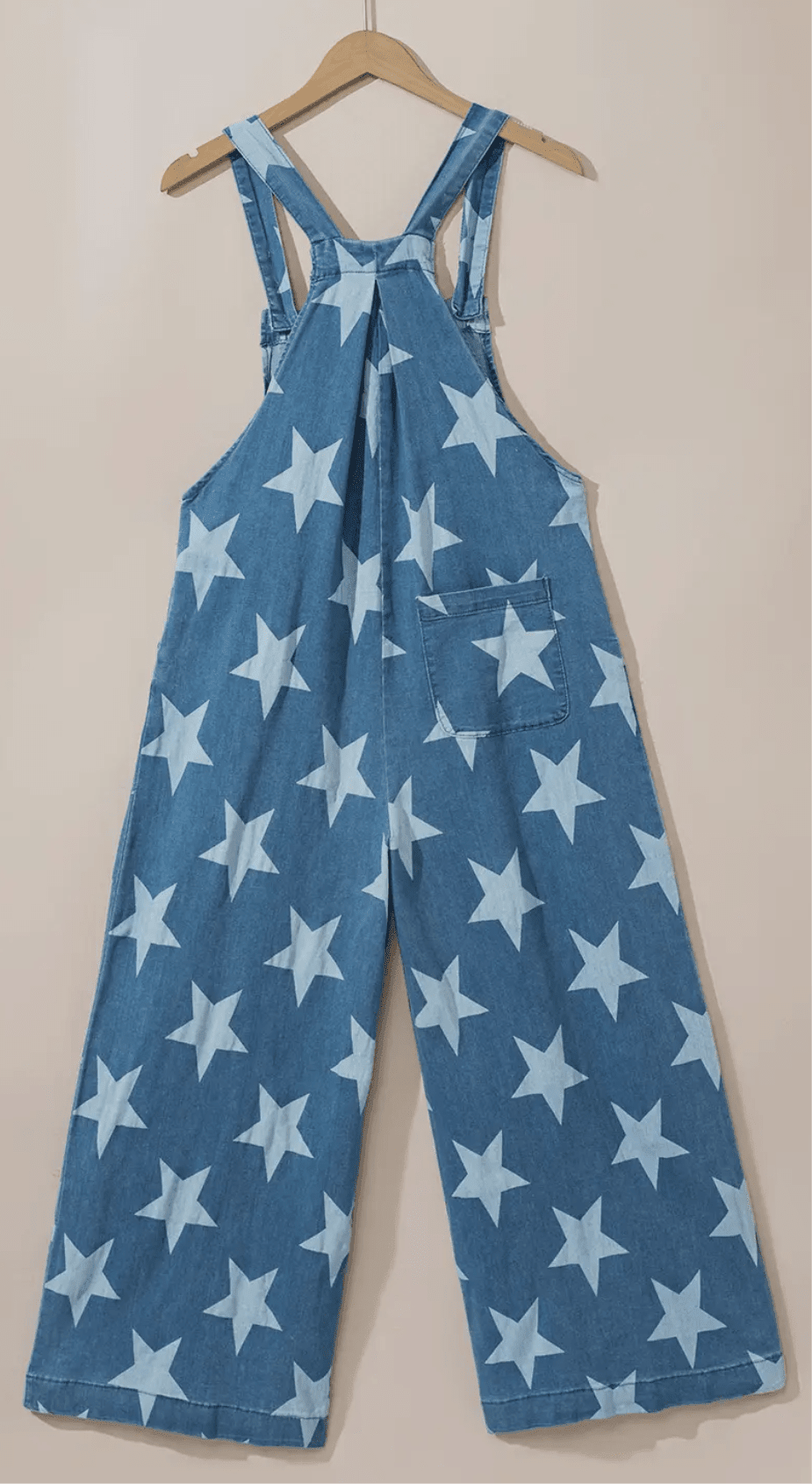 Apairella star print button strap denim overalls featuring adjustable shoulder straps and front pockets on light blue denim.