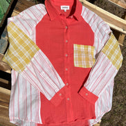 Color block blouse w/ solid, stripes, & plaid multicolored prints in deep coral, mustard & white textured design.