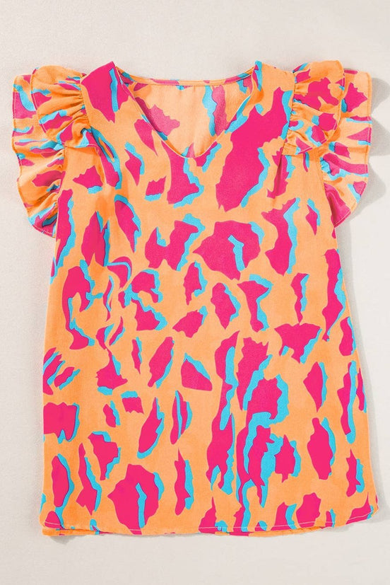 Light blue abstract V-neck blouse with ruffled sleeves from Little Daisy Closet, stylish top perfect for casual or dressy occasions.