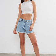 Women's cropped cotton tank top with crew neck from VAV New York, featuring a basic sleeveless design and relaxed fit.