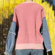 ADORA LA frayed denim sleeve sweater showing a cozy knit sweater with distressed denim-style sleeves and a relaxed fit.
