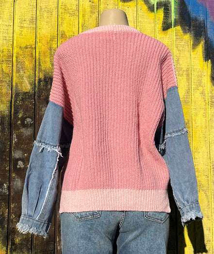ADORA LA frayed denim sleeve sweater showing a cozy knit sweater with distressed denim-style sleeves and a relaxed fit.