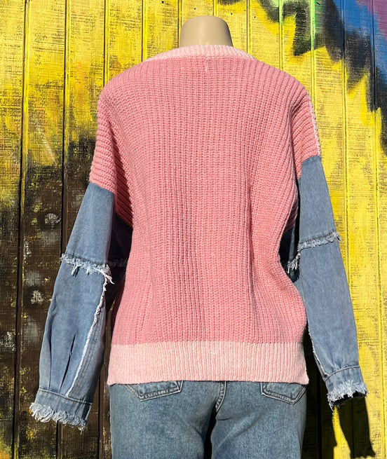 ADORA LA frayed denim sleeve sweater showing a cozy knit sweater with distressed denim-style sleeves and a relaxed fit.