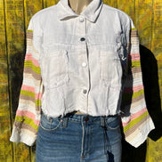 Bellissima Fashion denim patchwork jacket featuring colorful sewn patches and classic denim fabric, stylish and casual outerwear.