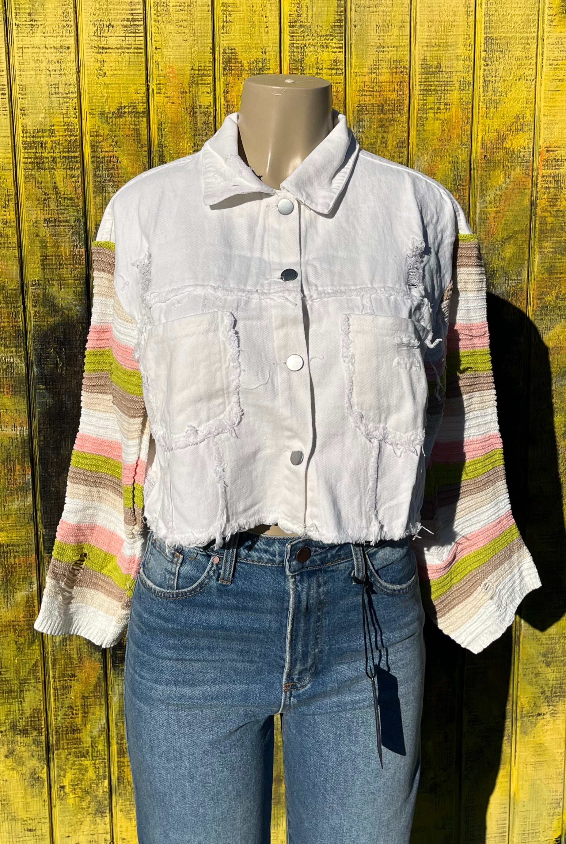 Bellissima Fashion denim patchwork jacket featuring colorful sewn patches and classic denim fabric, stylish and casual outerwear.