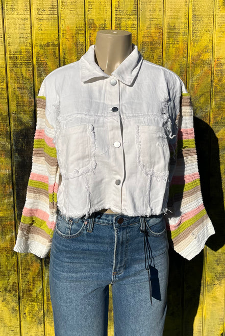 Bellissima Fashion denim patchwork jacket featuring colorful sewn patches and classic denim fabric, stylish and casual outerwear.