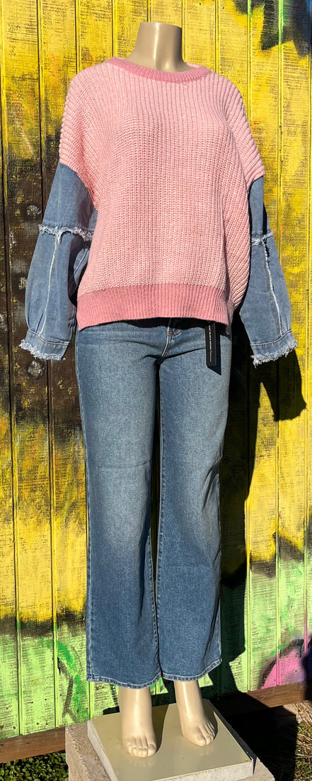 Light blue frayed denim sleeve sweater by ADORA LA featuring a cozy knit design and distressed denim accents.