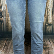 Light blue Judy Blue Boyfriend jeans featuring a relaxed fit, classic five-pocket design, and distressed detailing.