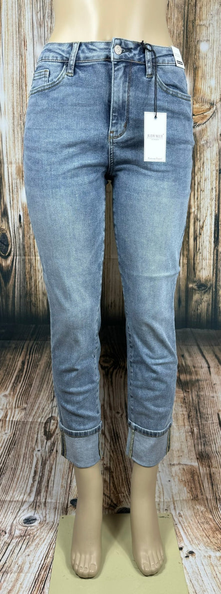 Light blue Judy Blue Boyfriend jeans featuring a relaxed fit, classic five-pocket design, and distressed detailing.