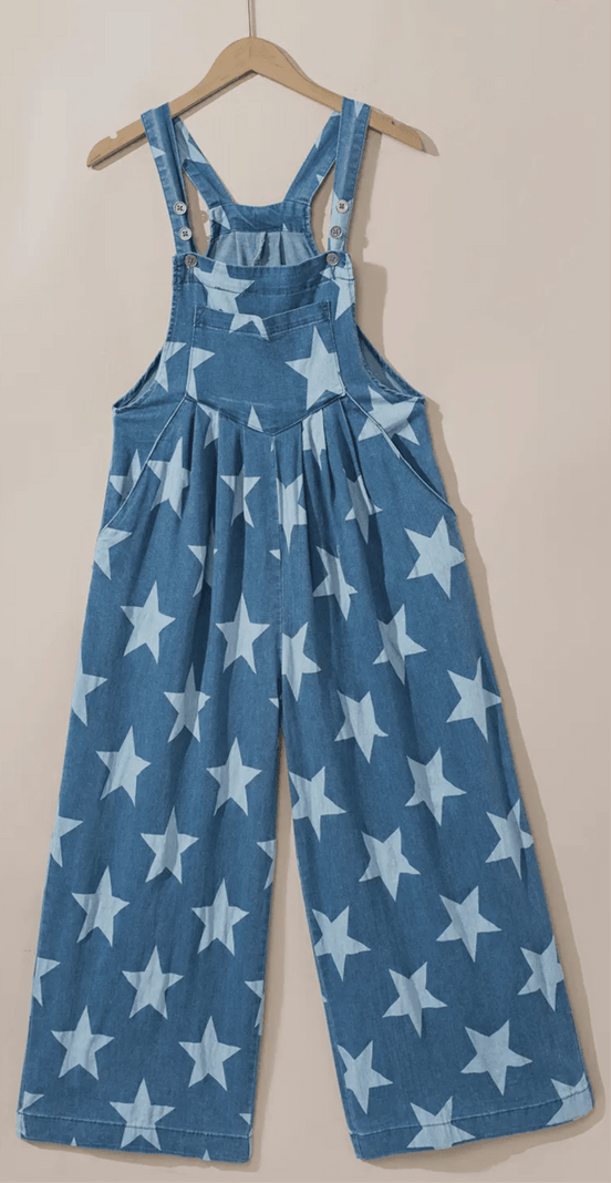 Aapparella star print button strap denim overalls featuring adjustable straps and front pockets on a light blue denim background.