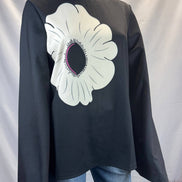 TrendyNewLook flared sleeves flower high-neck top featuring a stylish high neckline and flowy sleeve design.