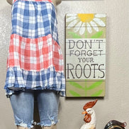 This red & blue denim checkered plaid baby doll top is tiered with a ruffled hem. Actual color may vary from images shown.
