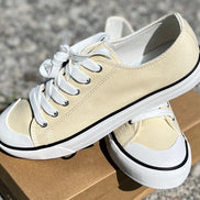 FASHION EMPORIO classic sneakers in white with laces and rubber soles, displayed from a side view on a neutral background.