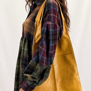 Mixed checkered woven babydoll top by Fantastic Fawn, featuring a loose fit and stylish pattern, worn as a casual or dressy top.